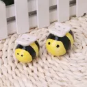Salière et poivrier en céramique en forme d'abeille