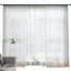 Rideau salon en tulle brodé design nordique