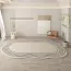 Tapis de salon en forme de rond irrégulier beige