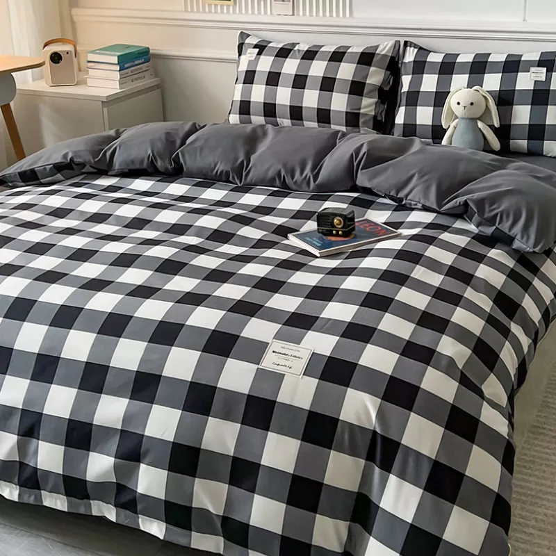 Linge de lit chambre motif damier nuances noir et blanc