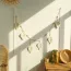 Décoration macramé pour intérieur en forme de feuilles