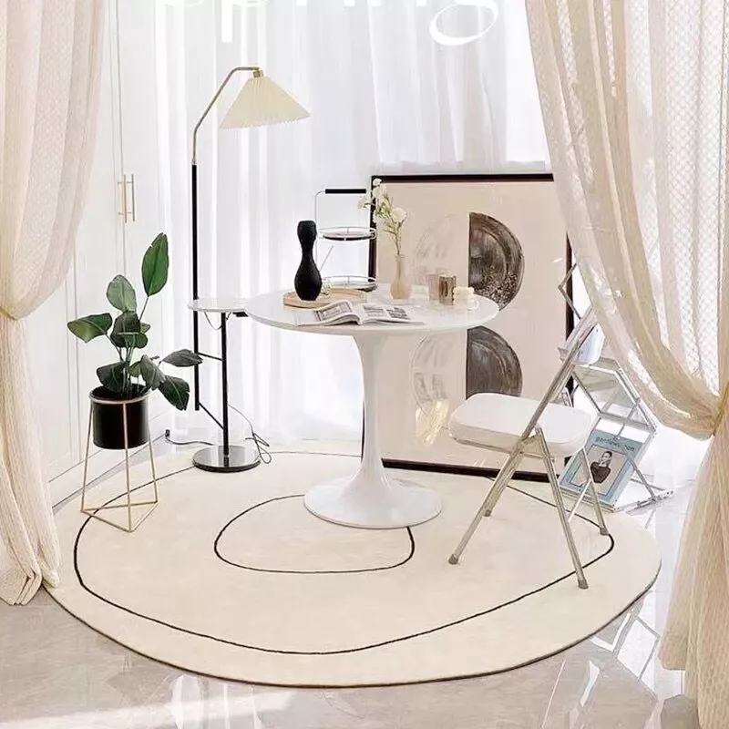 Tapis de chambre rond de couleur blanche au style classique