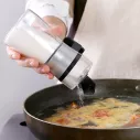 Salière et poivrier polyvalent en verre en forme d'une petite carafe