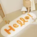 Tapis de chambre élégant blanc orné des motifs en lettres orange