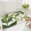 Tapis de salle de bain confortable en velours à feuilles vertes
