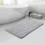 Tapis de salle de bain gris doux en mousse à mémoire