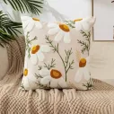 Housse de coussin en coton brodé avec motif floral