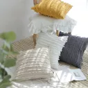 Housse de coussin en coton avec des franges horizontales