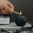 Bougie parfumée en forme de lune noire