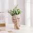 Vases en céramique avec visage rond