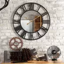 Horloge murale en métal noir avec chiffre romain et de surface miroir ronde 