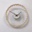 Horloge murale ronde avec cadran transparent et lunette en rotin