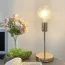 Lampe de chevet créative avec un pied doré en métal