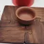 Dessous de verre en bois foncé de forme puzzle