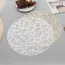 Set de table circulaire à motif feuilles en éventail