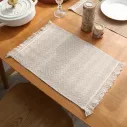 Set de table en jute avec une tendelle et frange